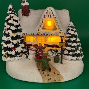 Festive Thomas Kinkade Hero’s Welcome Holiday Village House Teleflora